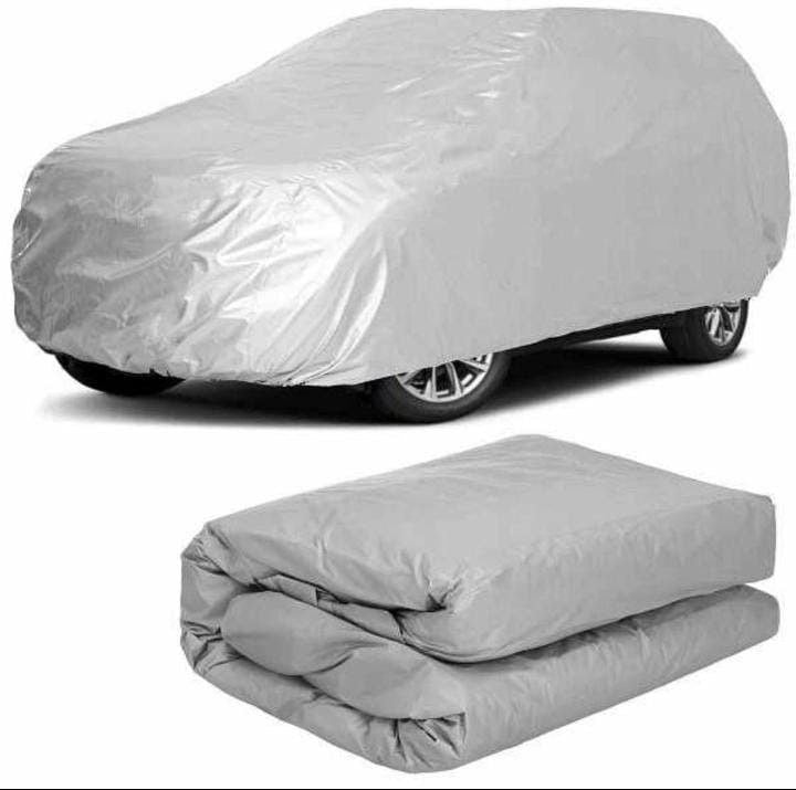 Bâche de protection intégrale argentée pour voiture, imperméable et réfléchissante, couvrant une berline et un SUV pour une protection contre le soleil. Disponible à Bangui, République Centrafricaine (RCA) chez 236 Shopping Centrafrique pour 19 990 FCFA