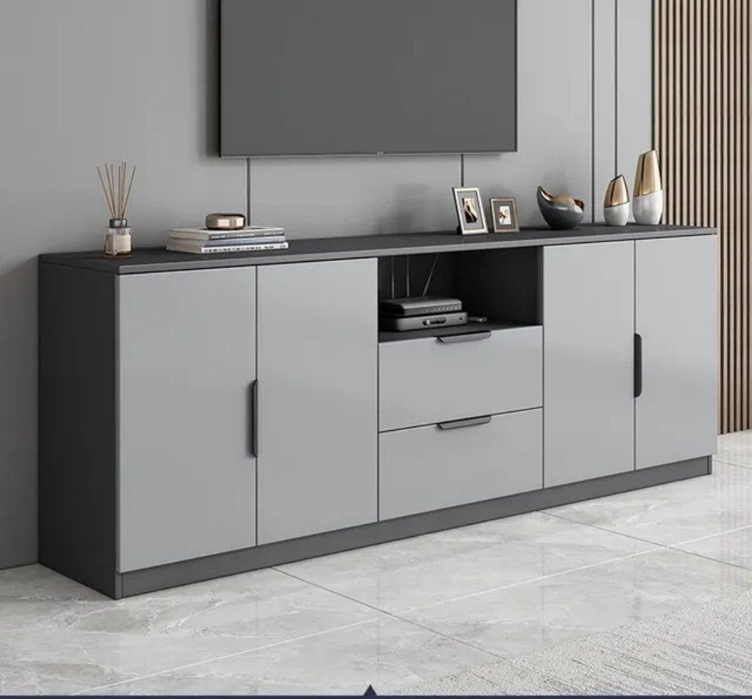 Meuble de rangement de salon gris anthracite moderne avec quatre portes de placard et deux tiroirs centraux, utilisé comme support TV. Dimensions 160x40x70cm, disponible à Bangui, République Centrafricaine chez 236 Shopping pour 119 990 FCFA.